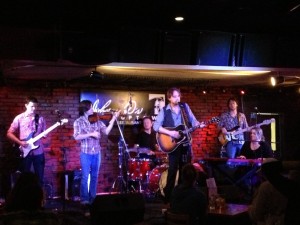 Hayes Carll fronts the Warren Hood Band at Johnny D's on June 11